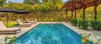 Modern farmhouse on the edge of town with pool.