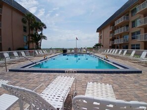 Outdoor pool, a heated pool - Beach Haven: 2B/2B Ground Floor Pool Side Condo (Cocoa Beach)
