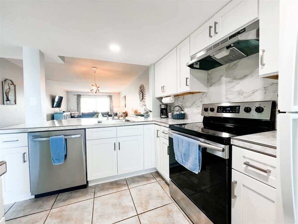 Fridge, microwave, oven, stovetop - Beach Haven: 2B/2B Ground Floor Pool Side Condo (Cocoa Beach)