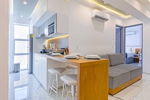 In-room safe, desk, laptop workspace, blackout curtains - Luxury Apartments Pool & Jacuzzi (Cancun)