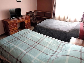 Quarto duplo clássico | 1 quarto, Wi-Fi de cortesia, roupa de cama