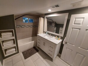 Combined shower/tub