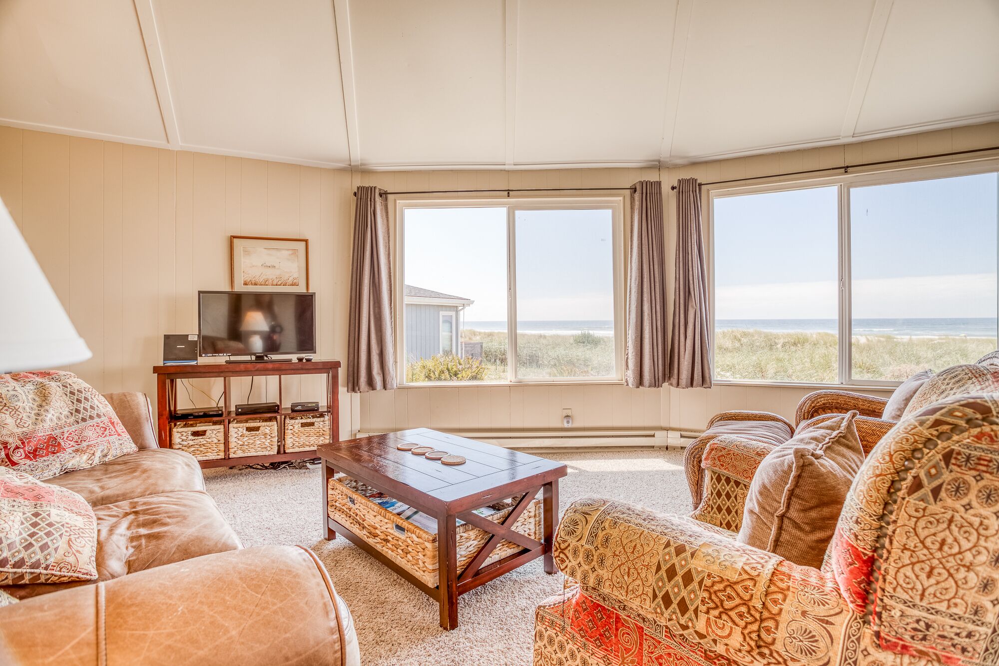 Cozy Oceanfront Home with Wrap Around Windows!  Beach access on the property!