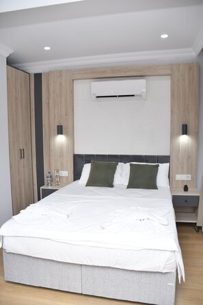 Literie de qualité, minibar, coffre-fort