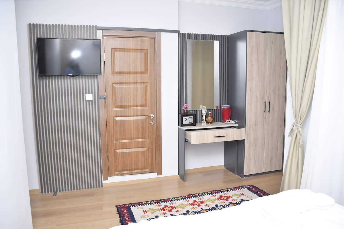 Premium bedding, minibar, in-room safe, laptop workspace
