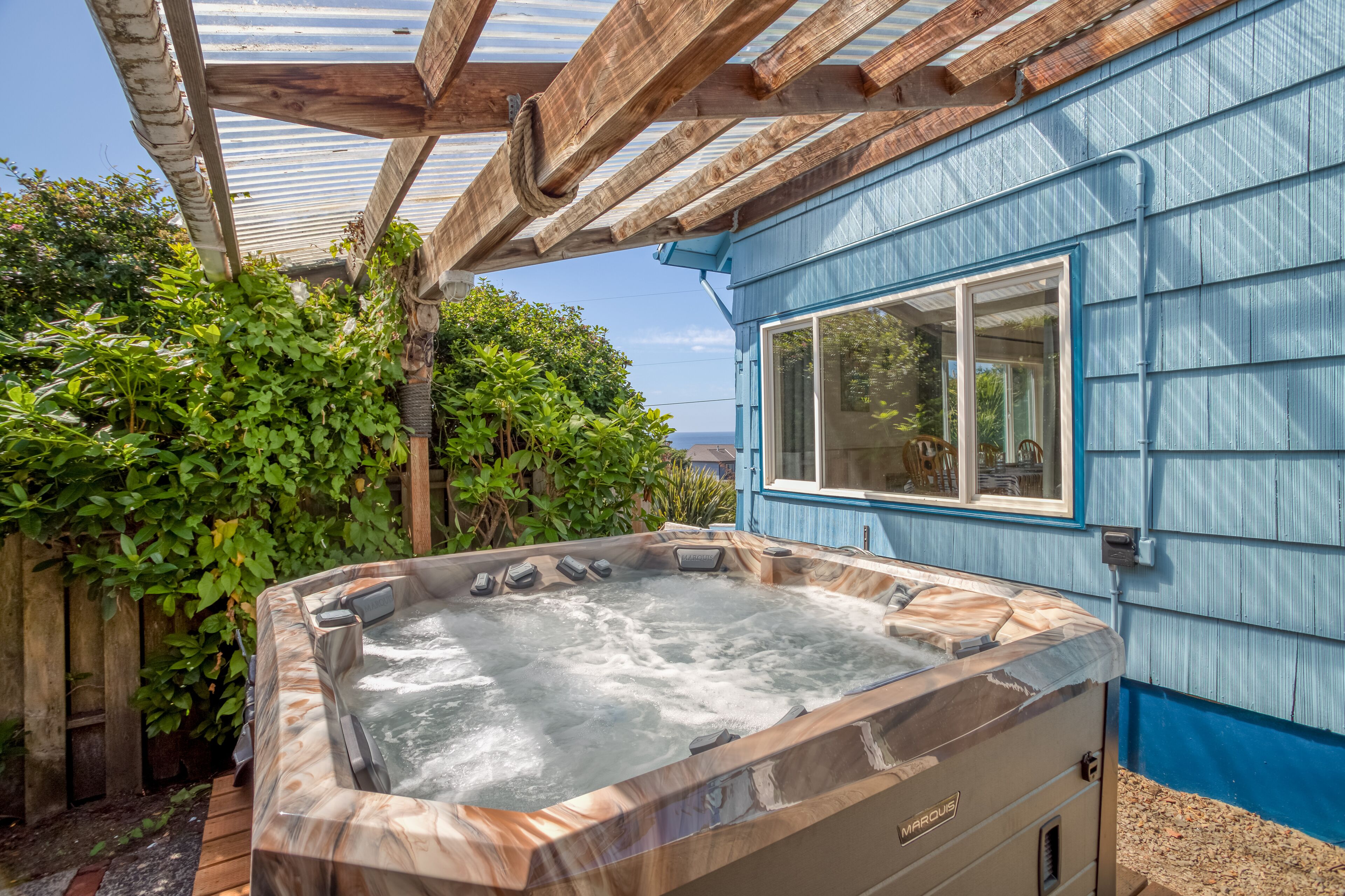 Roads End Ocean View Home Has Hot Tub, Second Living Area and Kids Playground!