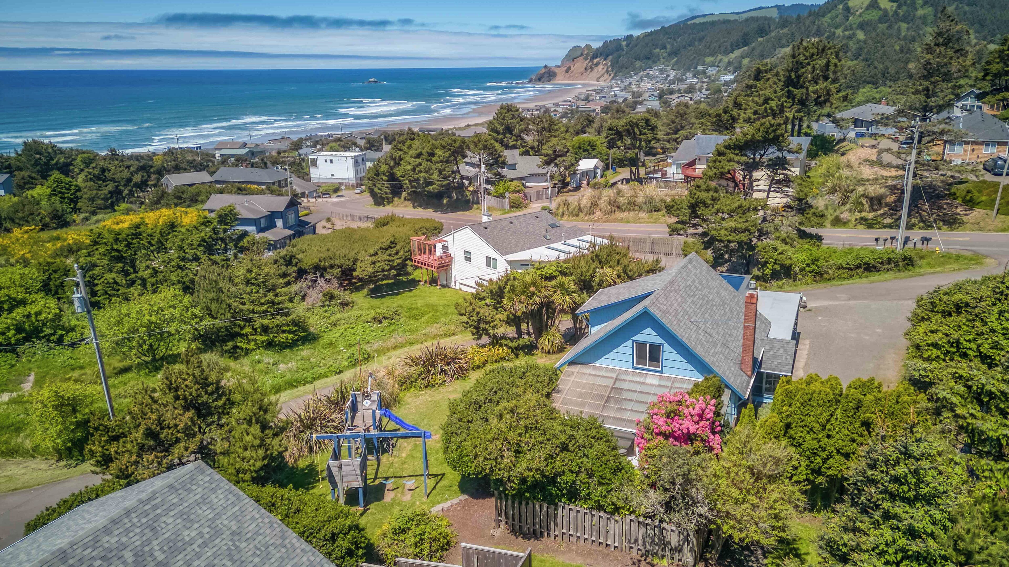 Roads End Ocean View Home Has Hot Tub, Second Living Area and Kids Playground!