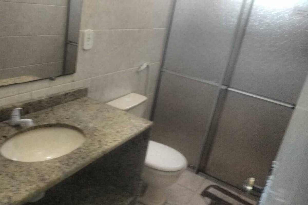 Shower, rainfall showerhead, bidet, towels