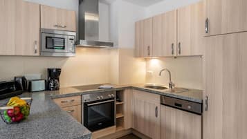 Oven, toaster, dining tables