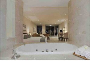 Combined shower/bathtub, hair dryer, towels, soap - Luxury Balinese Resort (Casuarina)
