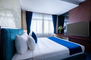 Junior Room | Minibar, in-room safe, individually furnished, desk