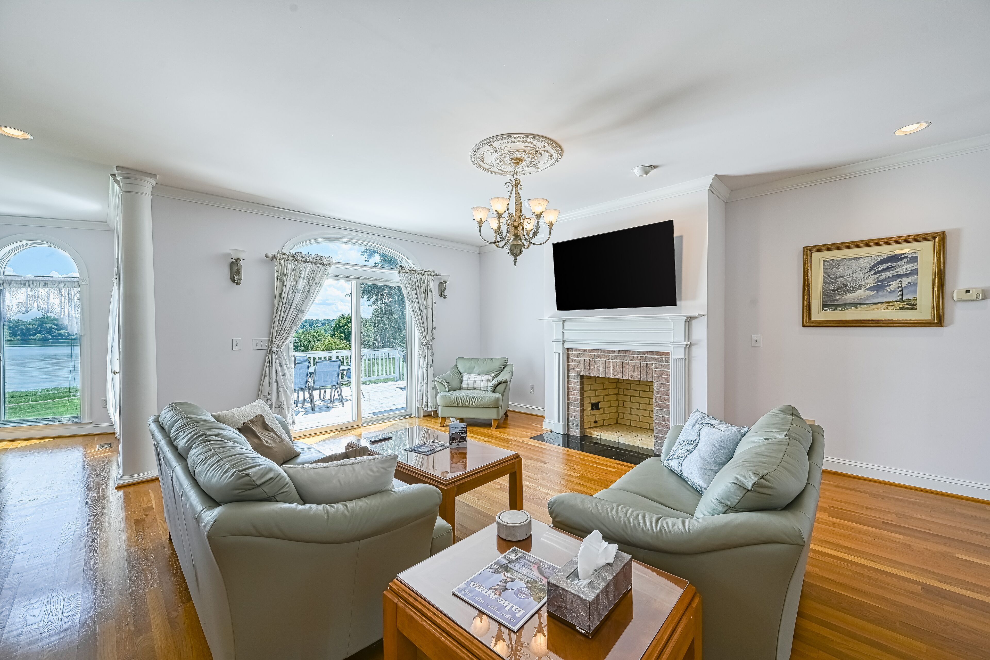 High-end lakefront home with dock, volleyball, Ping-Pong, 2 firepits & kayaks