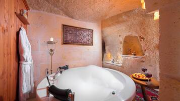 Deluxe Suit Cave Room 301 | Egyptian cotton sheets, premium bedding, in-room safe