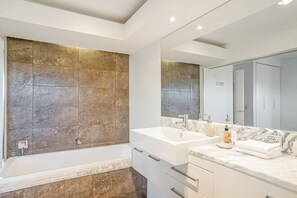 Shower, hair dryer, towels