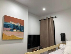 2 chambres, chambres insonorisées, fer et planche à repasser