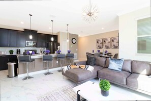 Townhome | Living area | 60-inch Smart TV with cable channels, Netflix, Hulu - Gorgeous 4 Bd w/ Pool at Champions Gate Resort 1020 (Davenport)