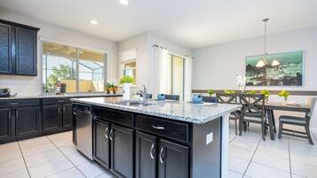 Townhome | Private kitchen | Coffee/tea maker, full-size fridge, microwave, oven