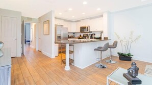 Townhome | Private kitchen | Coffee/tea maker, full-size fridge, microwave, oven