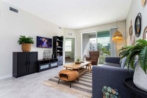 Condo | Living area | 60-inch Smart TV with cable channels, Netflix, Hulu - Accessible 3Bd Condo Close to Disney @ Storey Lake Orlando 208 3180 (Kissimmee)