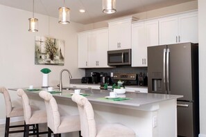 Townhome | Private kitchen | Full-size fridge, microwave, oven, stovetop - Gorgeous Decor 4 Bd w/ Pool Close to Disney 4820 (Kissimmee)