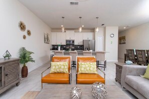 Townhome | Living room | 60-inch Smart TV with cable channels, Netflix, Hulu - Gorgeous Decor 4 Bd w/ Pool Close to Disney 4820 (Kissimmee)