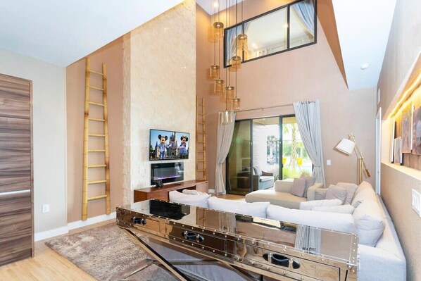 House | Living room | 60-inch Smart TV with cable channels, Netflix, Hulu