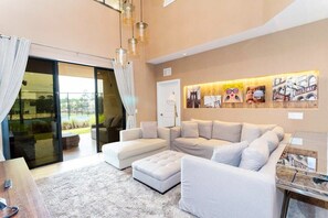 House | Living room | 60-inch Smart TV with cable channels, Netflix, Hulu