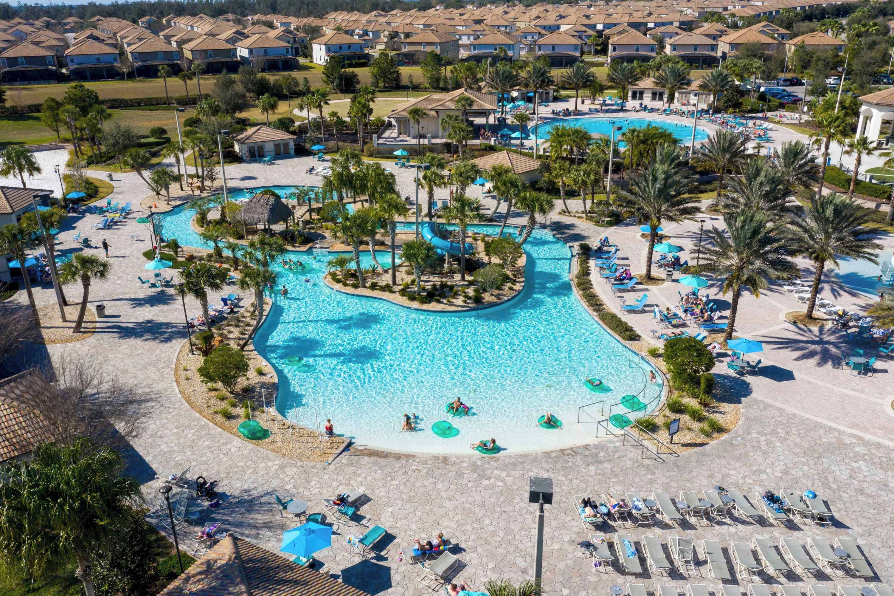 Outdoor pool, pool loungers, lifeguards on site