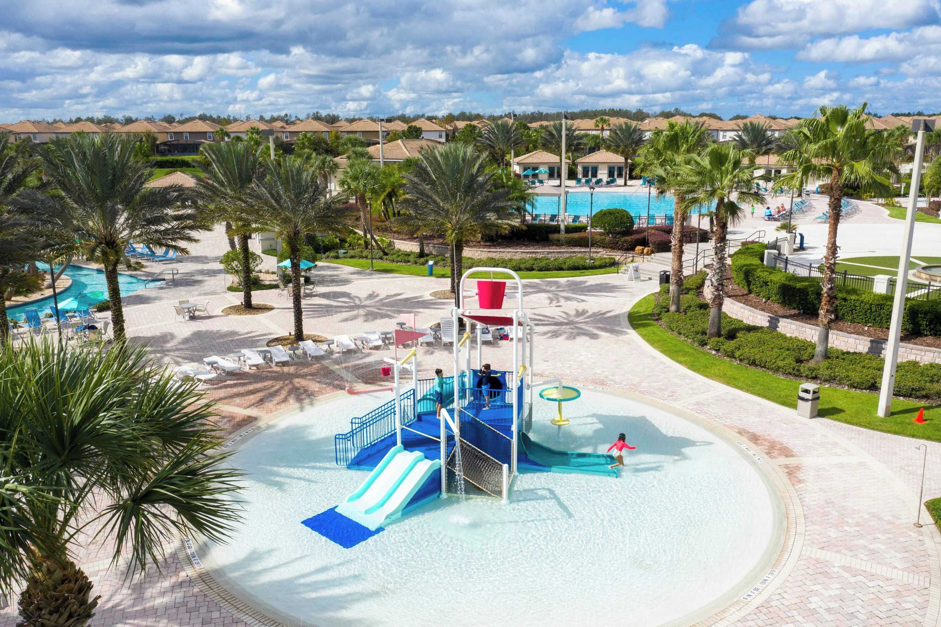 Outdoor pool, pool loungers, lifeguards on site