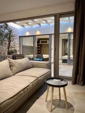 Superior Apartment | Living area | 43-inch Smart TV with satellite channels, TV - Sutivan Luxury Apartments (Sutivan)