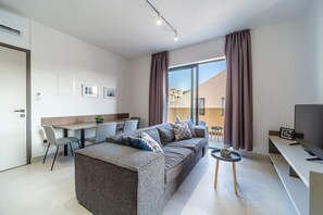 Comfort Apartment | Living area | 43-inch Smart TV with satellite channels, TV - Sutivan Luxury Apartments (Sutivan)
