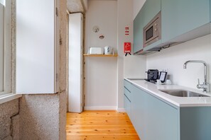 Fridge, microwave, coffee/tea maker, electric kettle