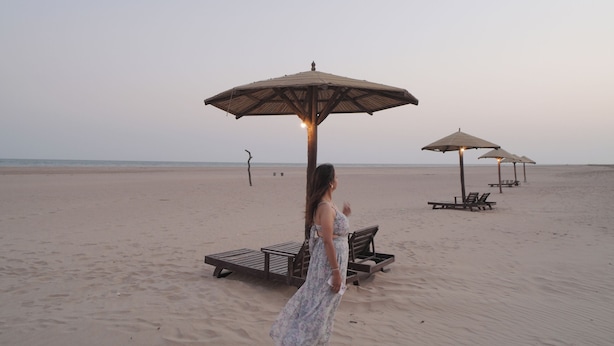 A beach with umbrellas and lounge chairs. - Palace Beach Camp (Mandvi)