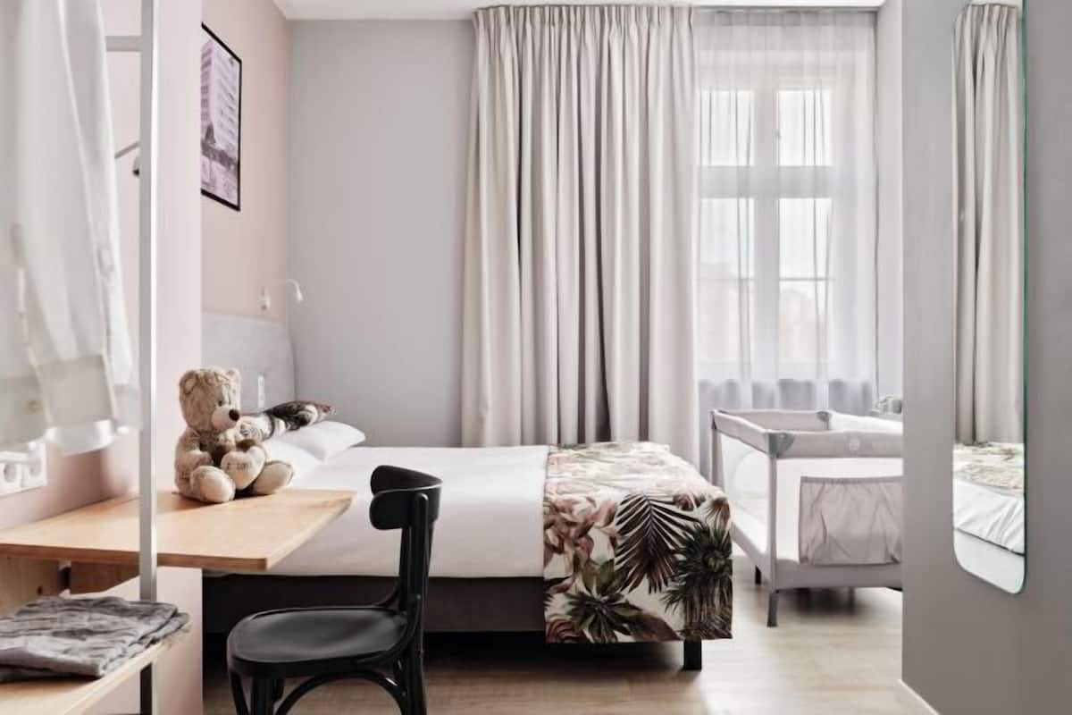 Desk, laptop workspace, iron/ironing board (on request), WiFi (free)