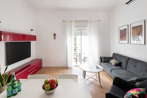 Exclusive Apartment | Living area | 55-inch flat-screen TV with cable channels, TV - F33 by TLV2RENT (Tel Aviv)