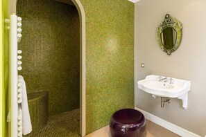 Bathtub, hair dryer, soap, shampoo