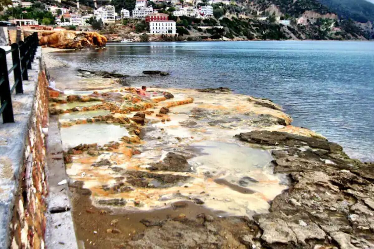 A coastal area with rocky terrain and a sea view.