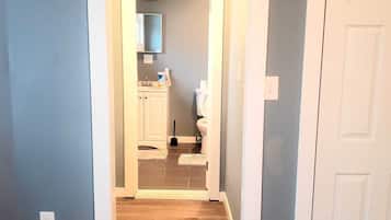 Combined shower/tub, hair dryer, towels, soap