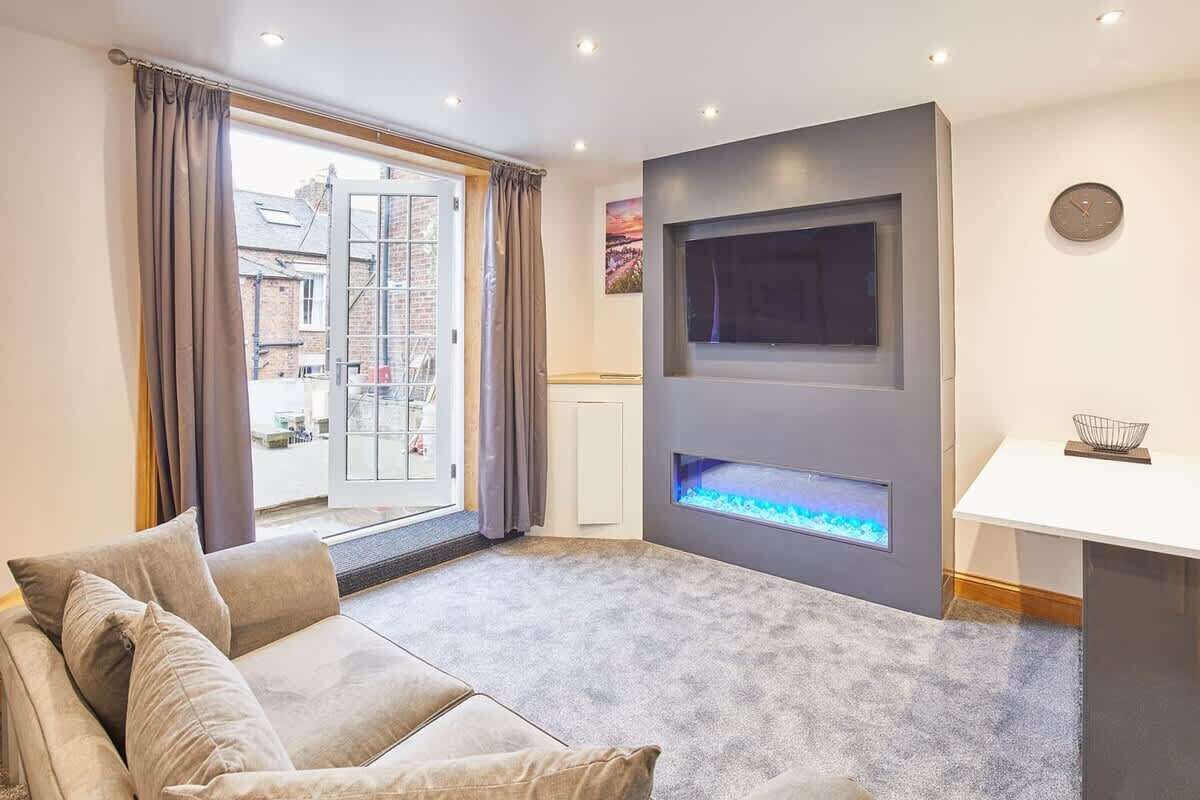 Flat-screen TV, fireplace, offices
