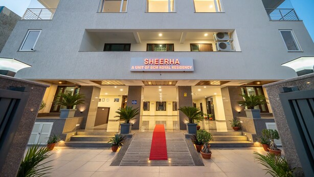A modern building with a sign reading "SHEERHA A UNIT OF BCM ROYAL RESIDENCY". - Sheerha Royal Residency (Jaipur)