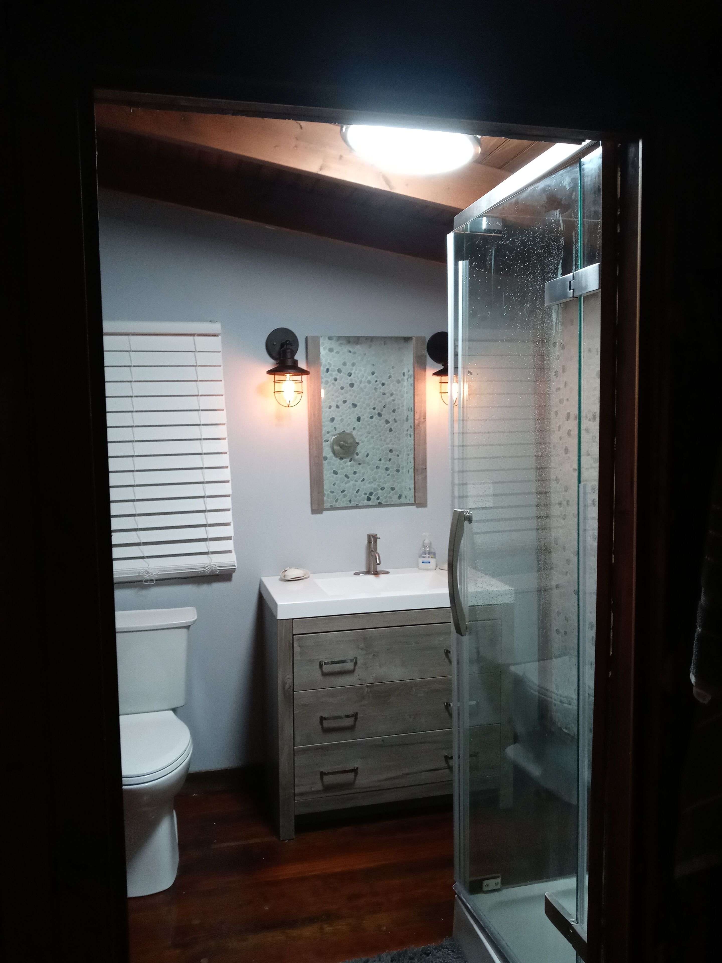 Shower, towels, soap, toilet paper