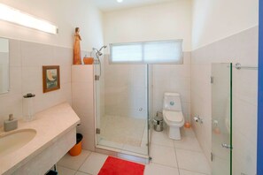 Bathtub, hair dryer, towels, soap