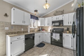 Fridge, microwave, oven, stovetop - O'Fallon Edge Oasis- 4bd/3bt, Wooded Backyard, Office, Great Family Getaway  (O'Fallon)