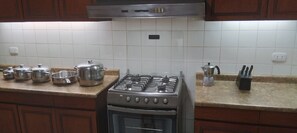 Fridge, oven, coffee/tea maker, toaster