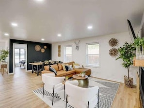TV, fireplace, offices - Posh 6BR/3B Home with Pool, Media/Game Room (Dallas)
