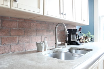 Kitchen with concrete countertops
