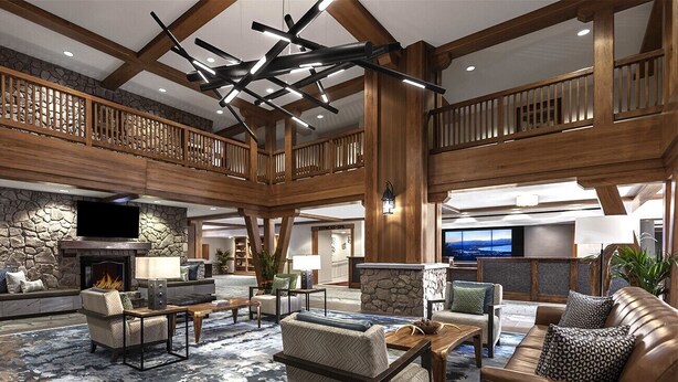 A spacious lobby with a high ceiling, stone fireplace, and modern lighting fixtures. - MARRIOTT Resort AUG 26,27 -130 USD-Hot tub -GYM -Kitchen (South Lake Tahoe)