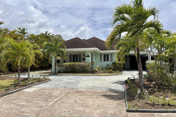GiGi Villa view from the private street in the Palms Community.