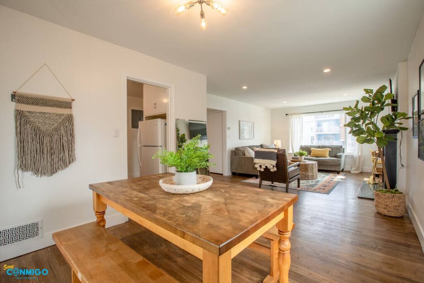 Smart TV, fireplace, books, offices