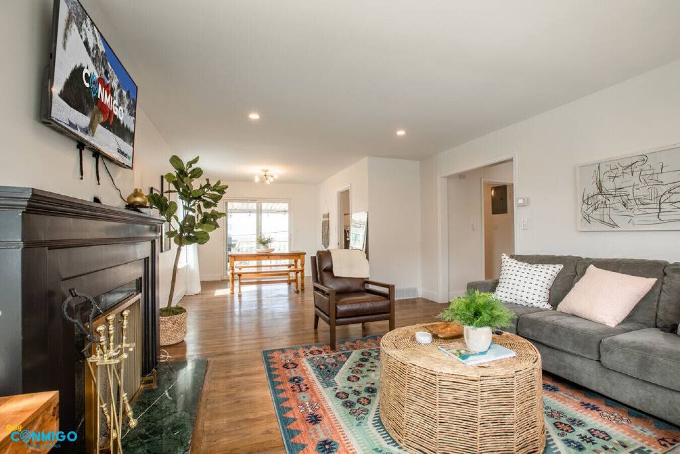 Smart TV, fireplace, books, offices